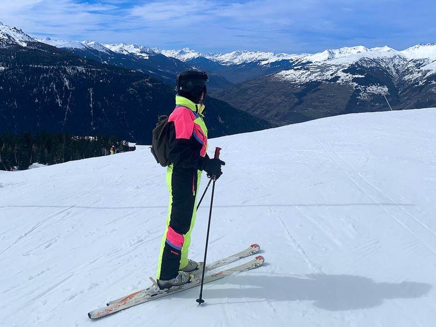 lady skiing on ski slope